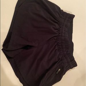 5” black lululemon track shorts
